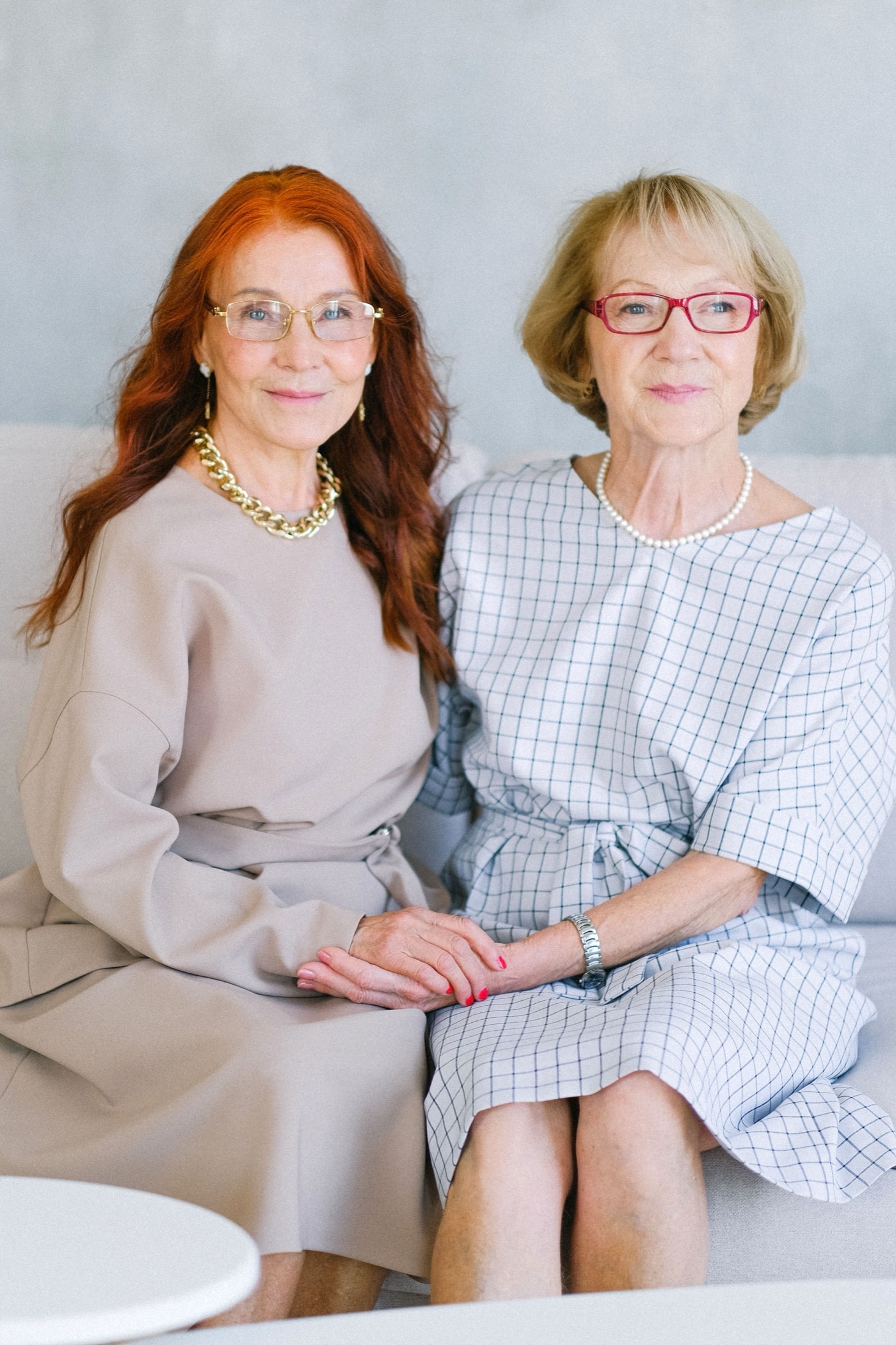 Two residents sitting together, smiling
