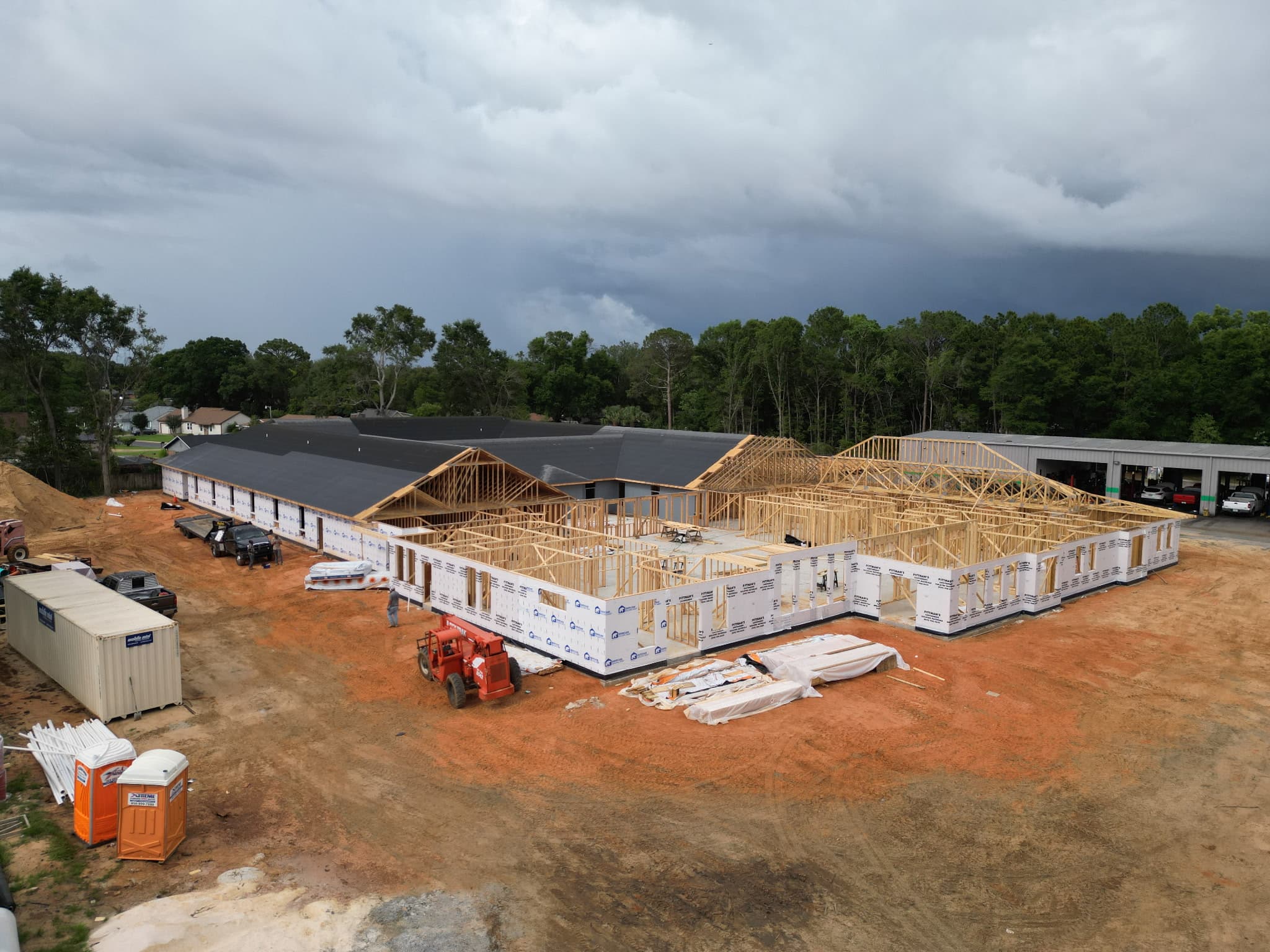 Aerial view of Scarlet Manor under construction, framing underway