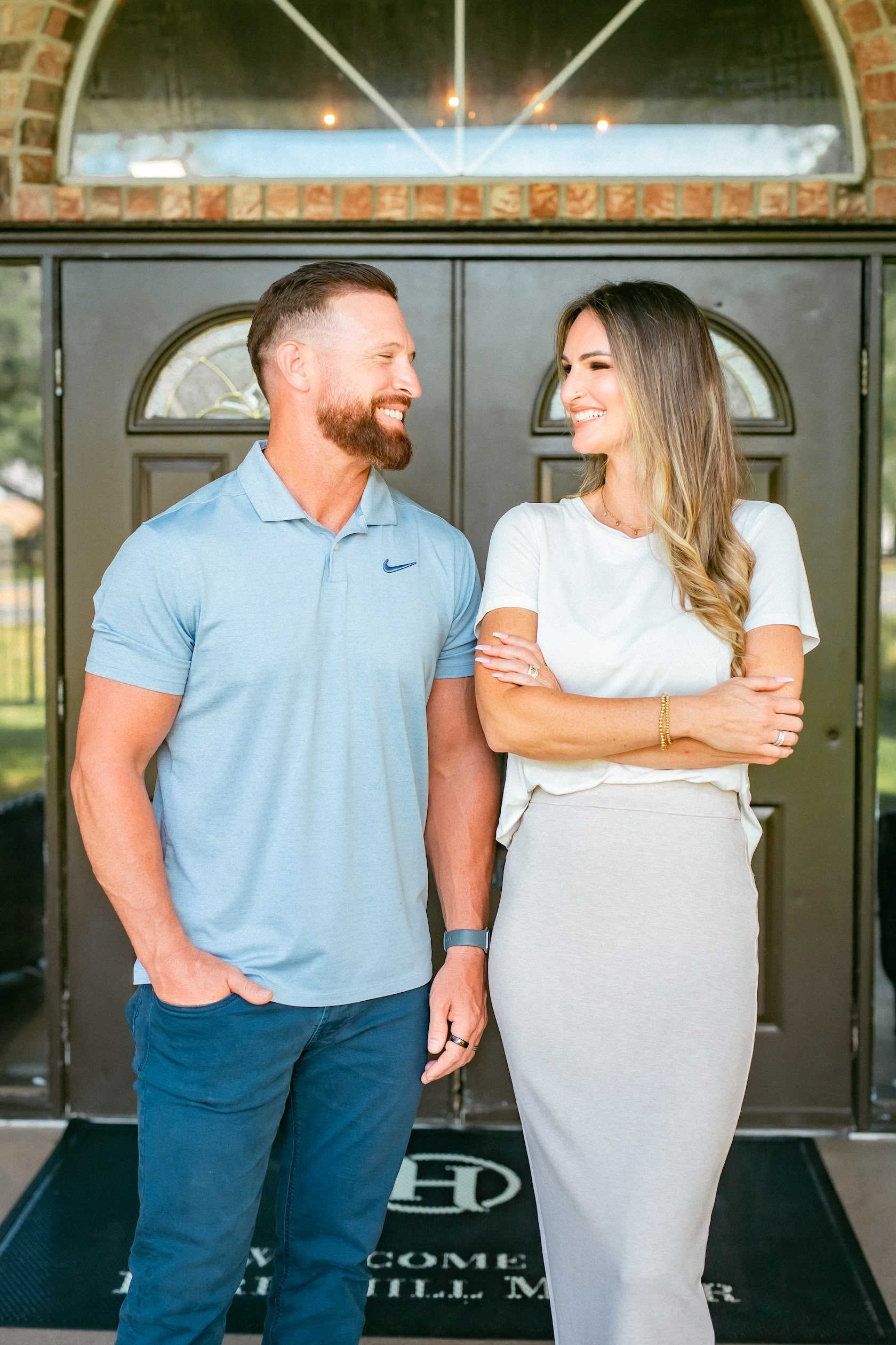 Russell and Brittany Harris at the front door of Berryhill Manor